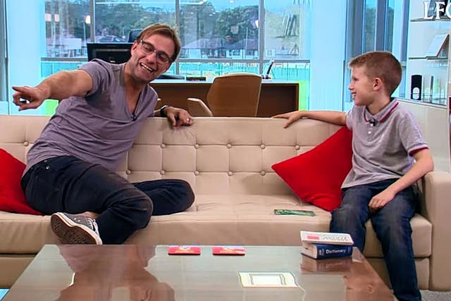 Jürgen Klopp on the sofa with his nine-year-old interviewer and Scouse tutor Isaac