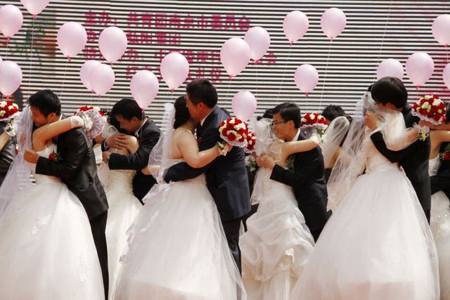 A May Day mass wedding in Nanjing. Thousands of ‘heterosexual’ marriages are in fact a front for gay couples in China