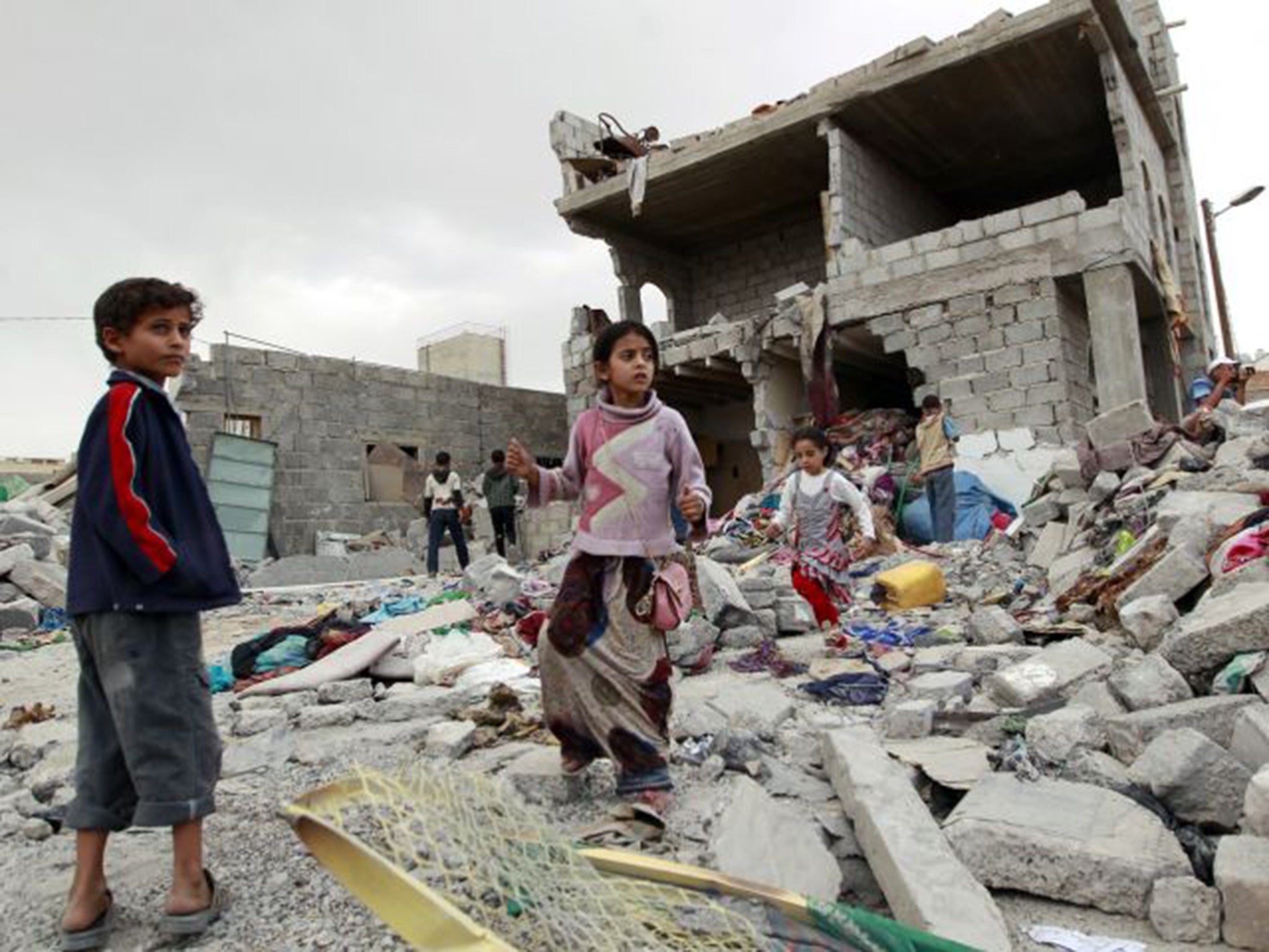 The aftermath of an air strike by the Saudi-led coalition on Sanaa on 13 July; 1.5 million people have been displaced