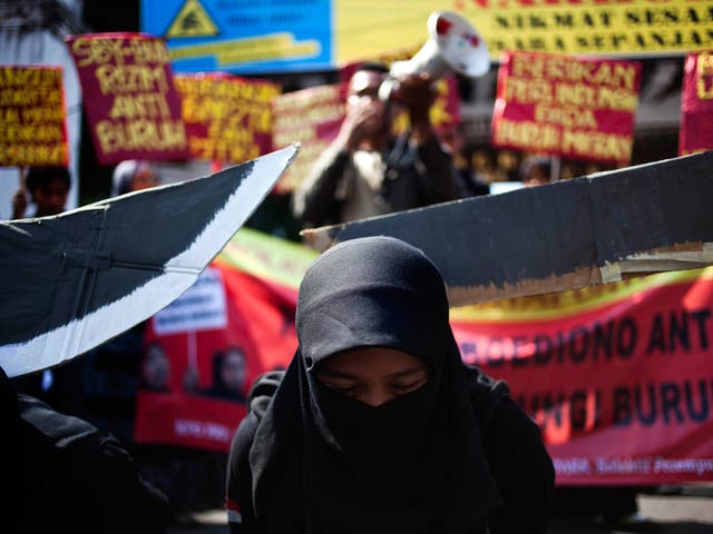 Indonesian protesters demonstrate after the execution of an Indonesian maid in Saudi Arabia