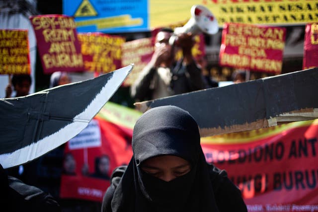 Indonesian protesters demonstrate after the execution of an Indonesian maid in Saudi Arabia