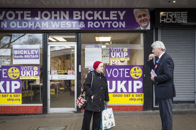 John Bickley canvasses in front of his campaign base