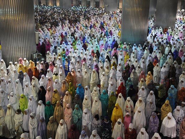 Indonesian Muslims perform the 'tarawih' prayer marking the first eve of Islam's holy month Ramadan in Jakarta