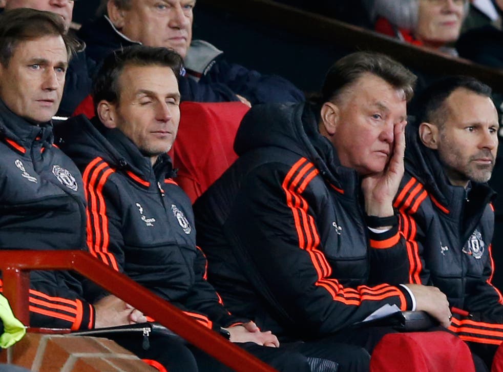 A grim-faced Louis van Gaal (second from the right) watches Wednesday’s 0-0 draw with PSV Eindhoven