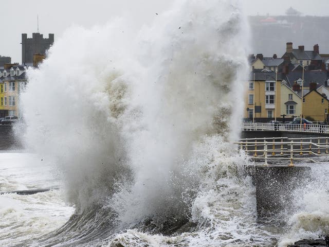 Waves and high winds batter the shore