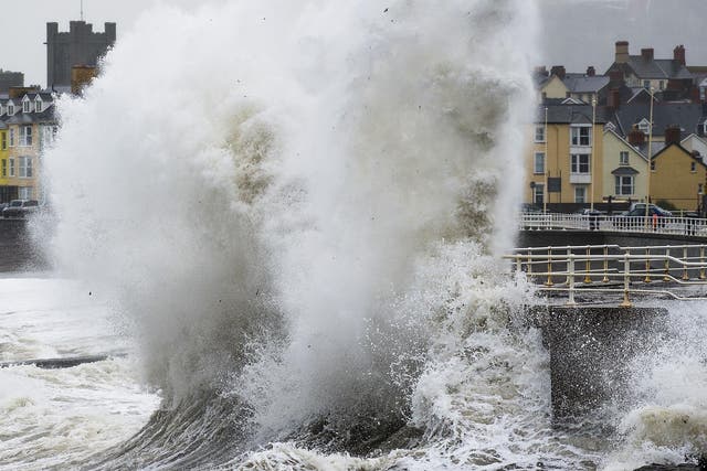 Waves and high winds batter the shore