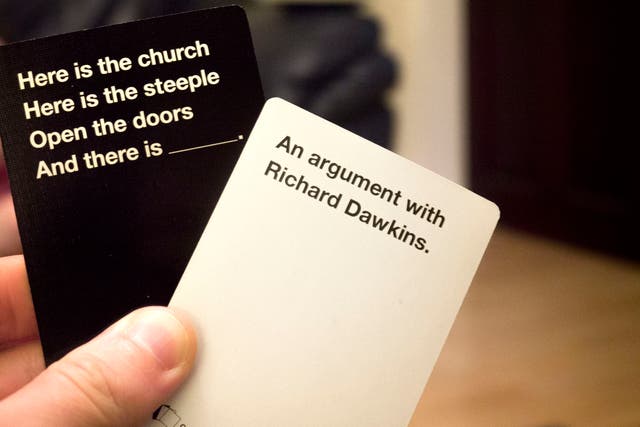 A white card and a black card from Cards Against Humanity