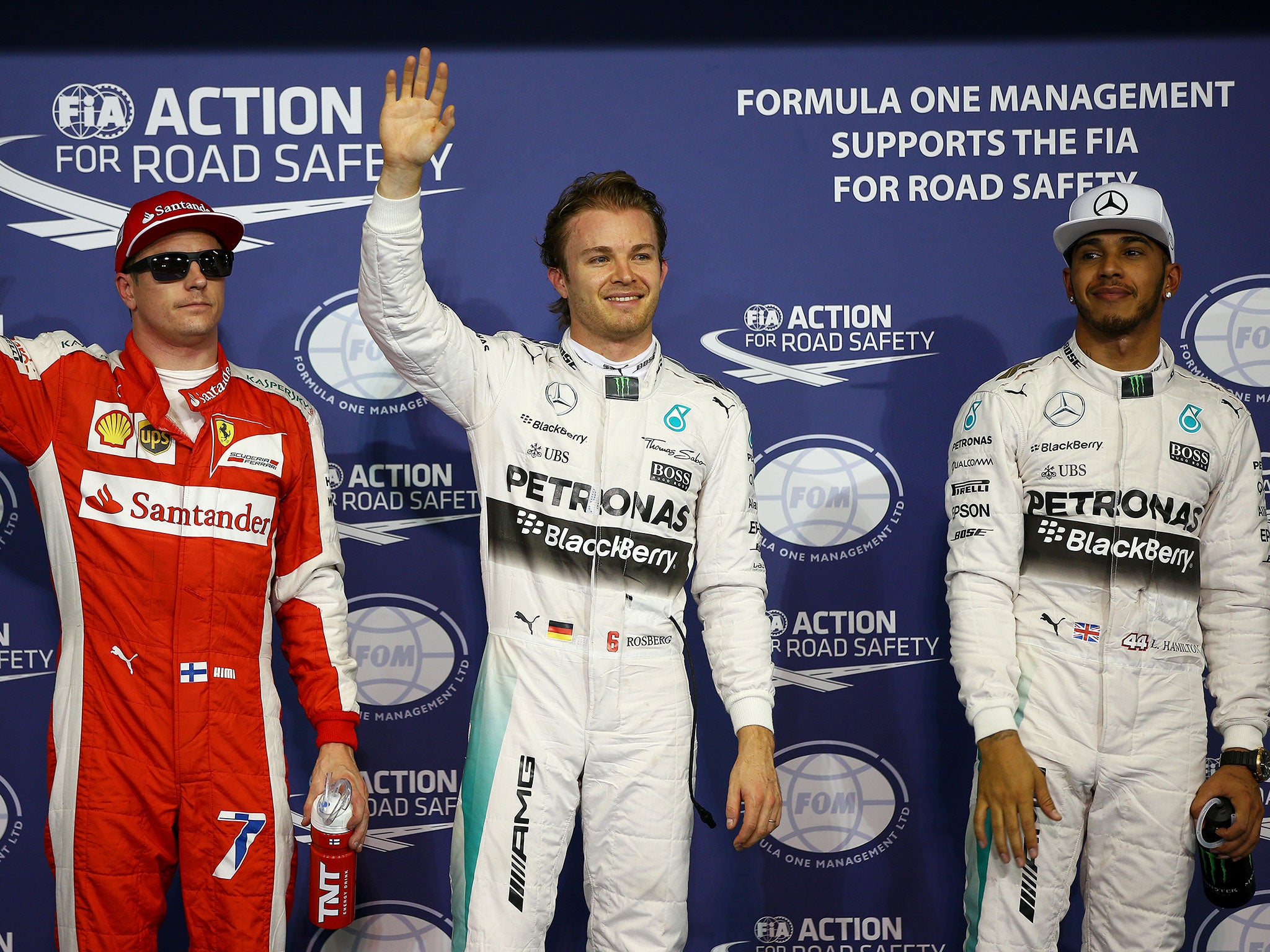 Nico Rosberg celebrates his pole in Abu Dhabi ahead of Lewis Hamilton