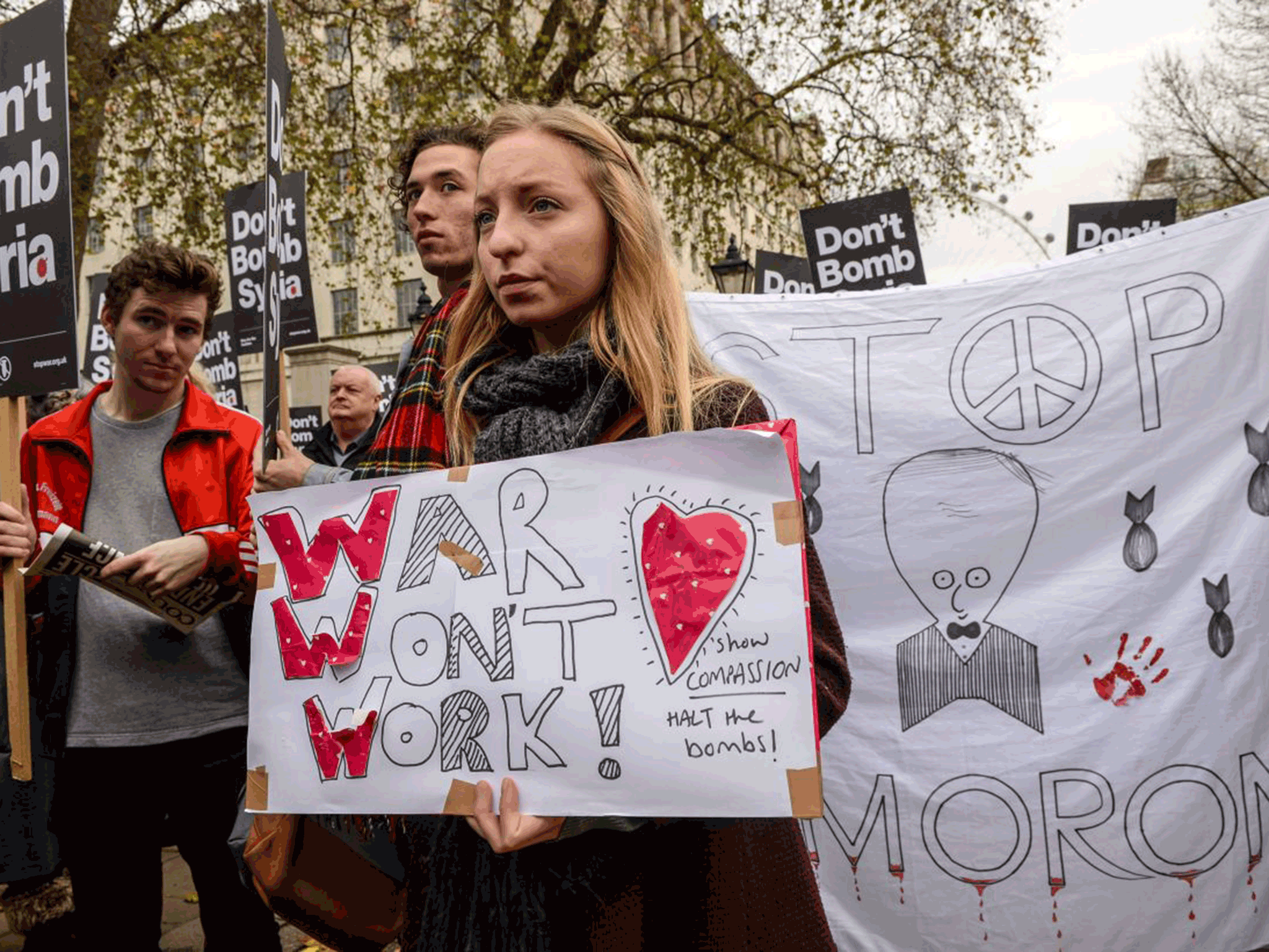 An anti-war protester amongst the crowd Getty Images