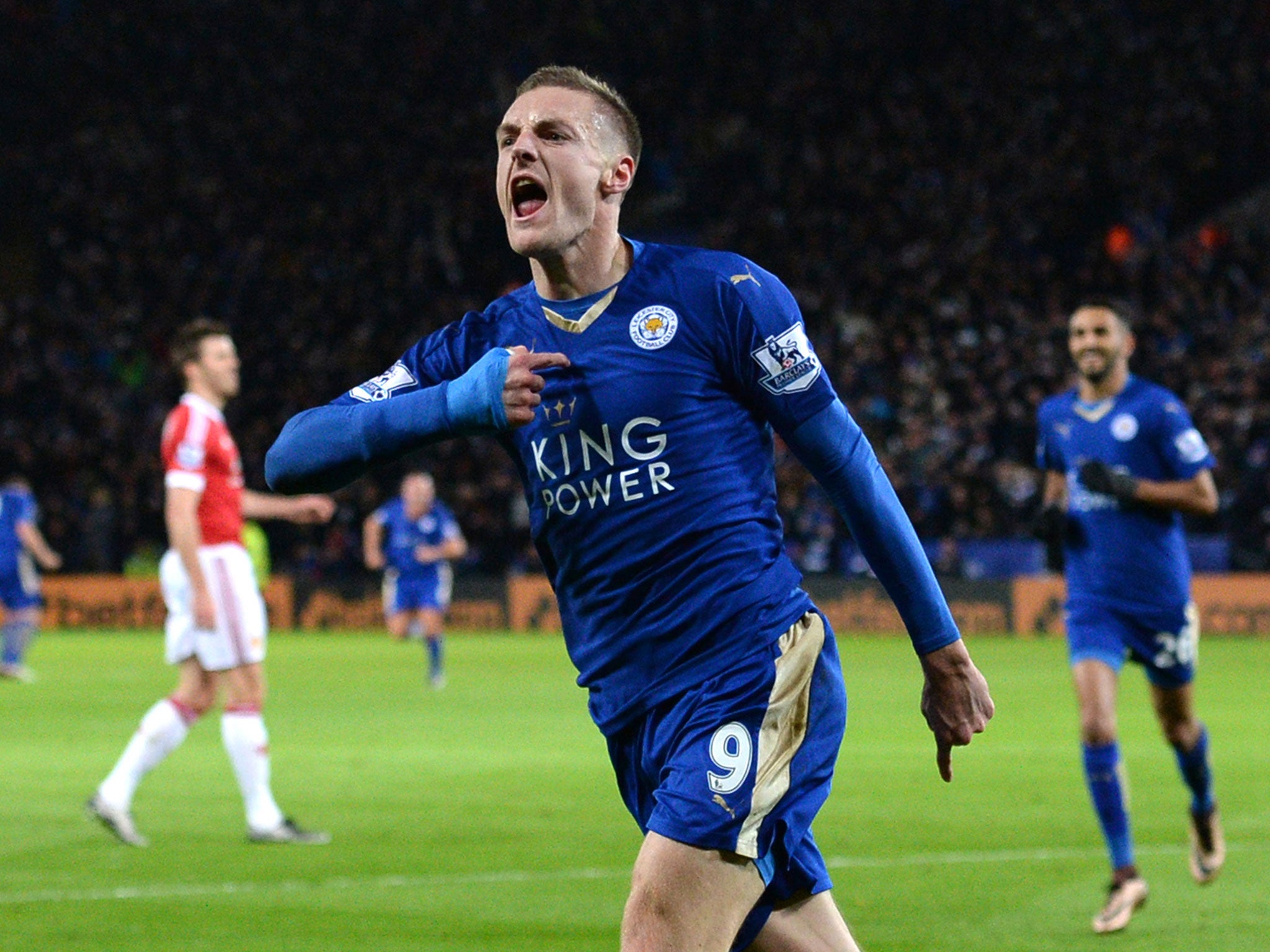 Jamie Vardy celebrates after scoring the opener against Manchester United
