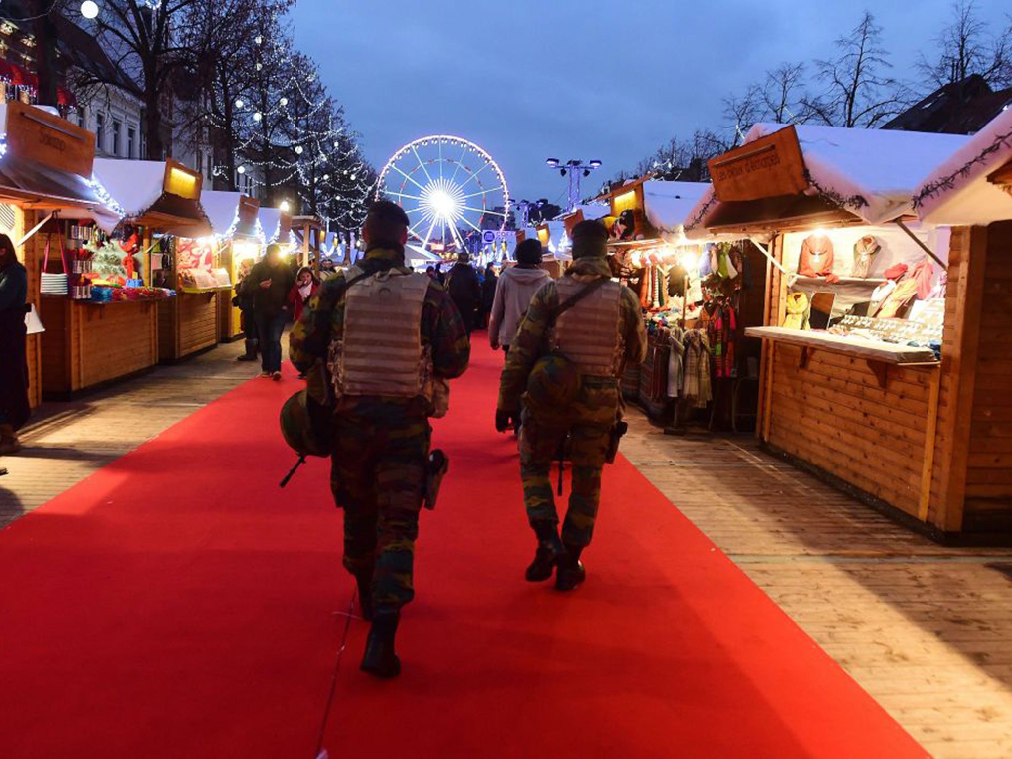 Soldiers patrol a Christmas market in Brussels