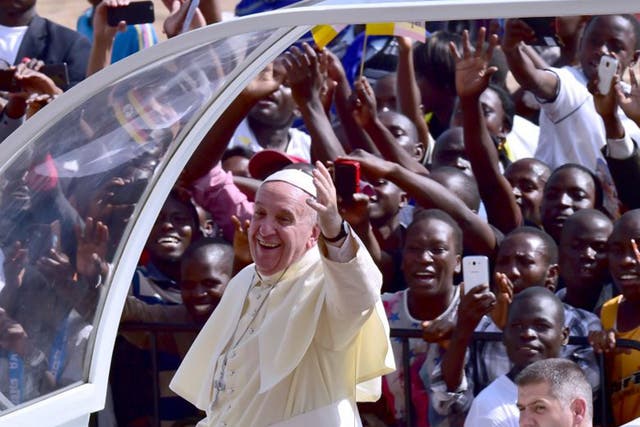 The Pope arrives at Kololo airstrip in Kampala, Uganda
