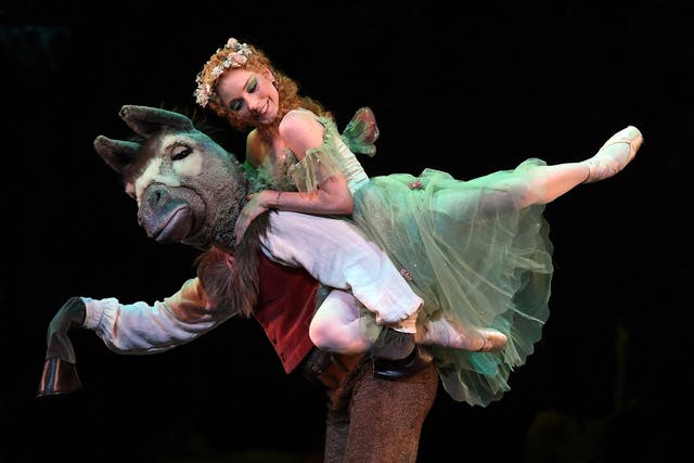 Titania leaps onto Bottom's back in a 2015 performance of A Midsummer Nights Dream in New York