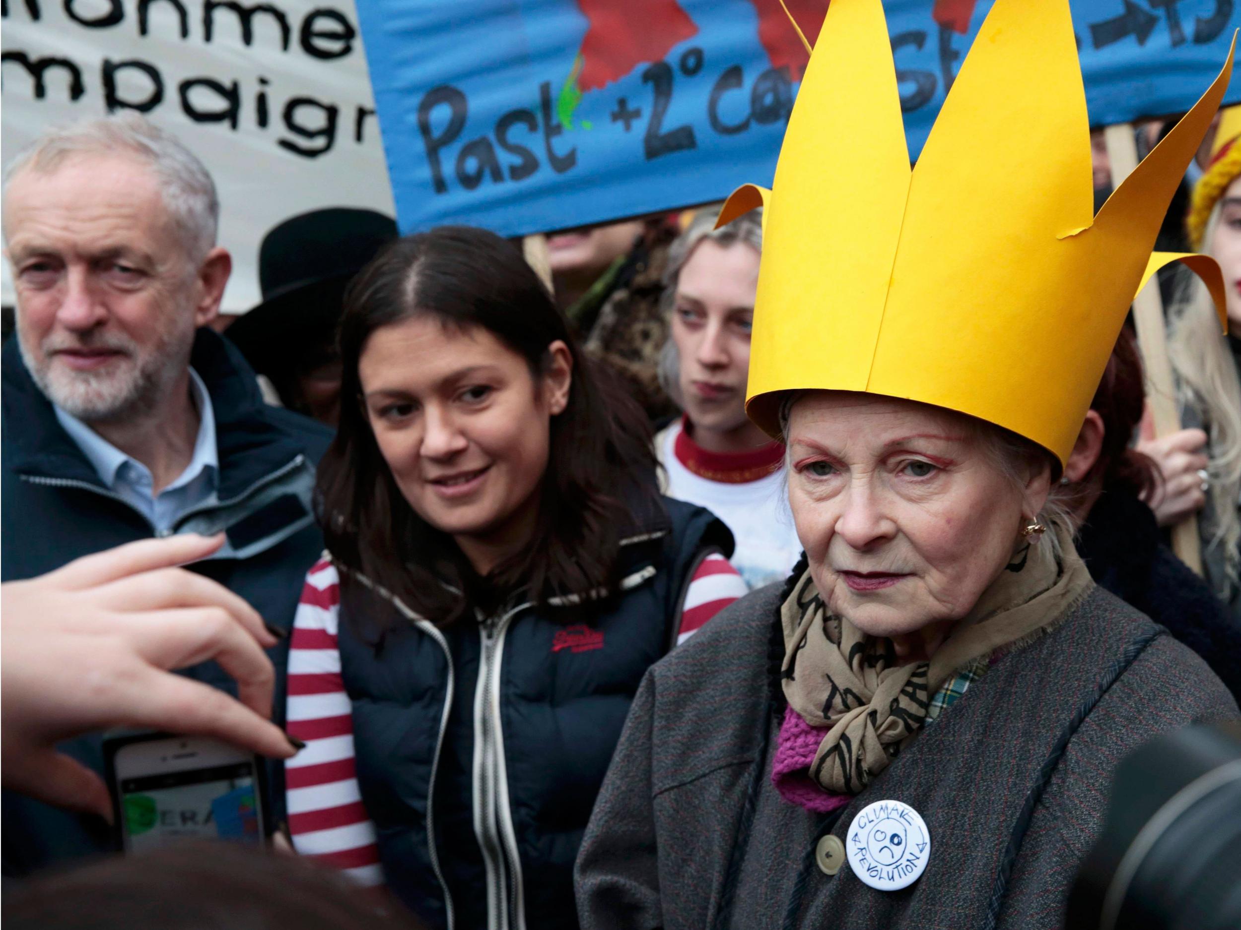 Britain's leader of the opposition Labour Party, Jeremy Corbyn (L), and fashion designer Vivienne Westwood (R) attend a rally held the day before the start of the Paris Climate Change Summit, in London