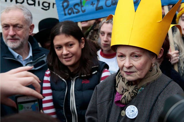 Britain's leader of the opposition Labour Party, Jeremy Corbyn (L), and fashion designer Vivienne Westwood (R) attend a rally held the day before the start of the Paris Climate Change Summit, in London