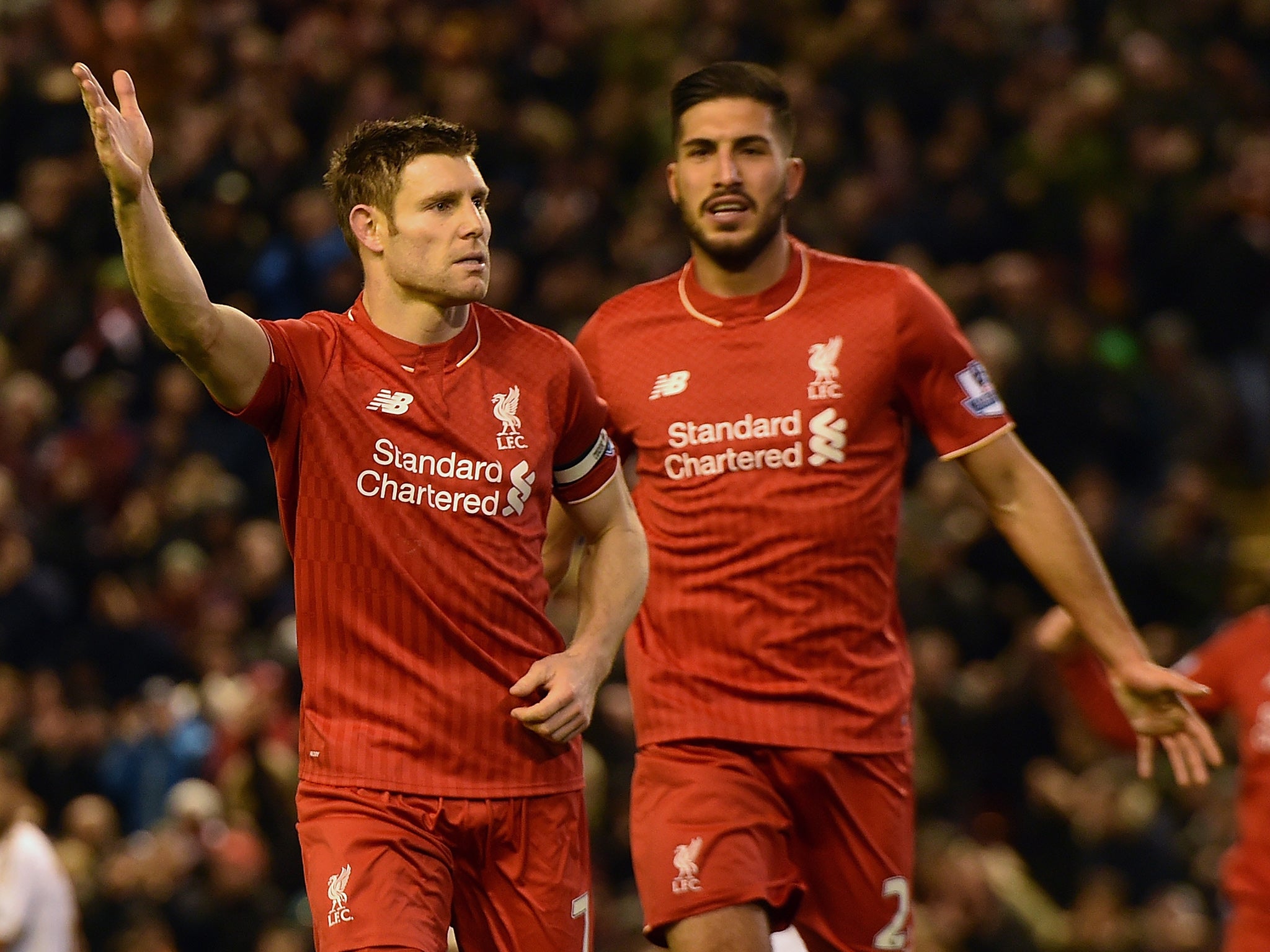 James Milner salutes the Kop after scoring the game's only goal