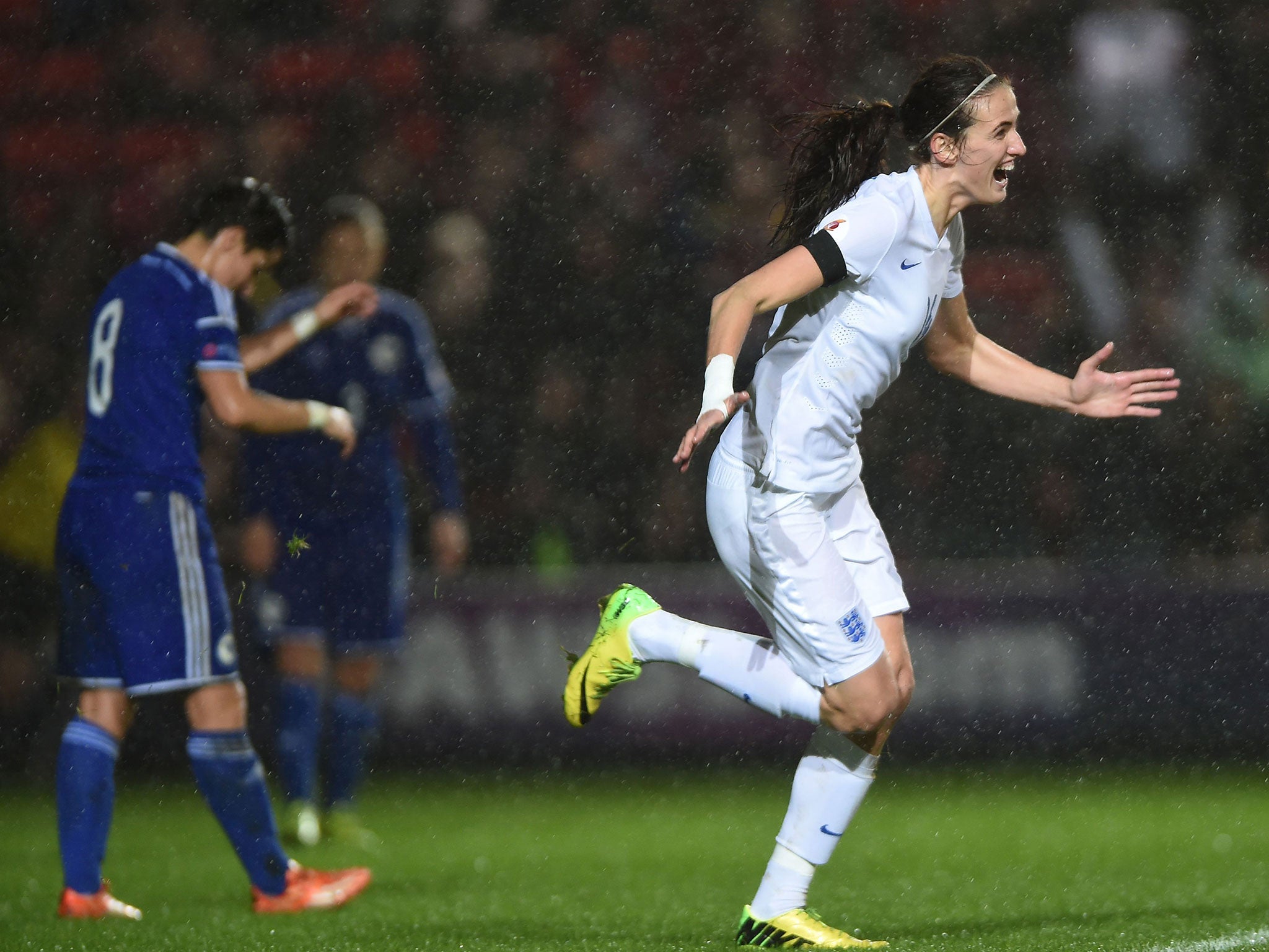 England midfielder Jill Scott, right, celebrates after scoring the only goal of the game