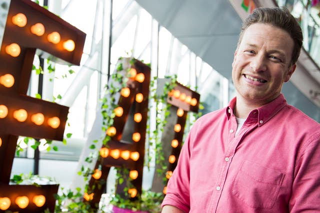 TV chef Jamie Oliver championed a drive for labels indicating spoonfuls of sugar in fizzy drinks