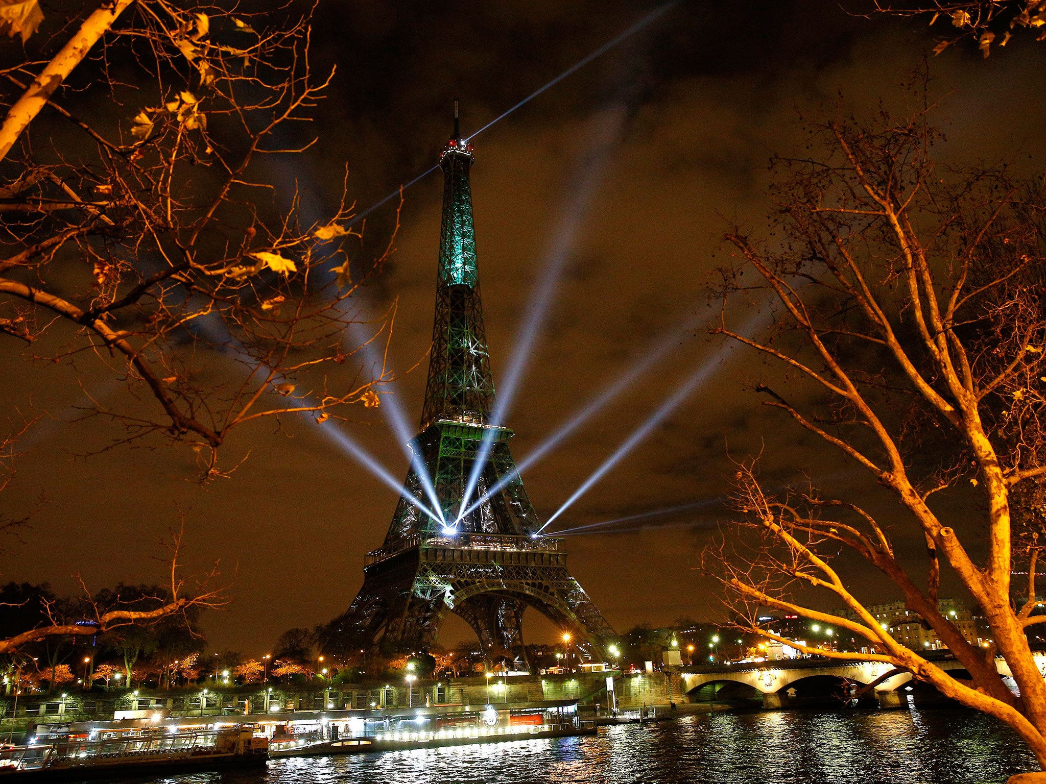 &#13;
The Eiffel Tower lights up with colors and messages of hope&#13;