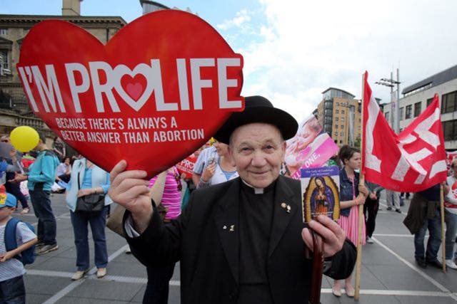 A priest attending an anti-abortion rally at Custom House Square in Belfast City centre