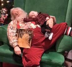 Picture of baby with 'sleeping Santa' goes viral