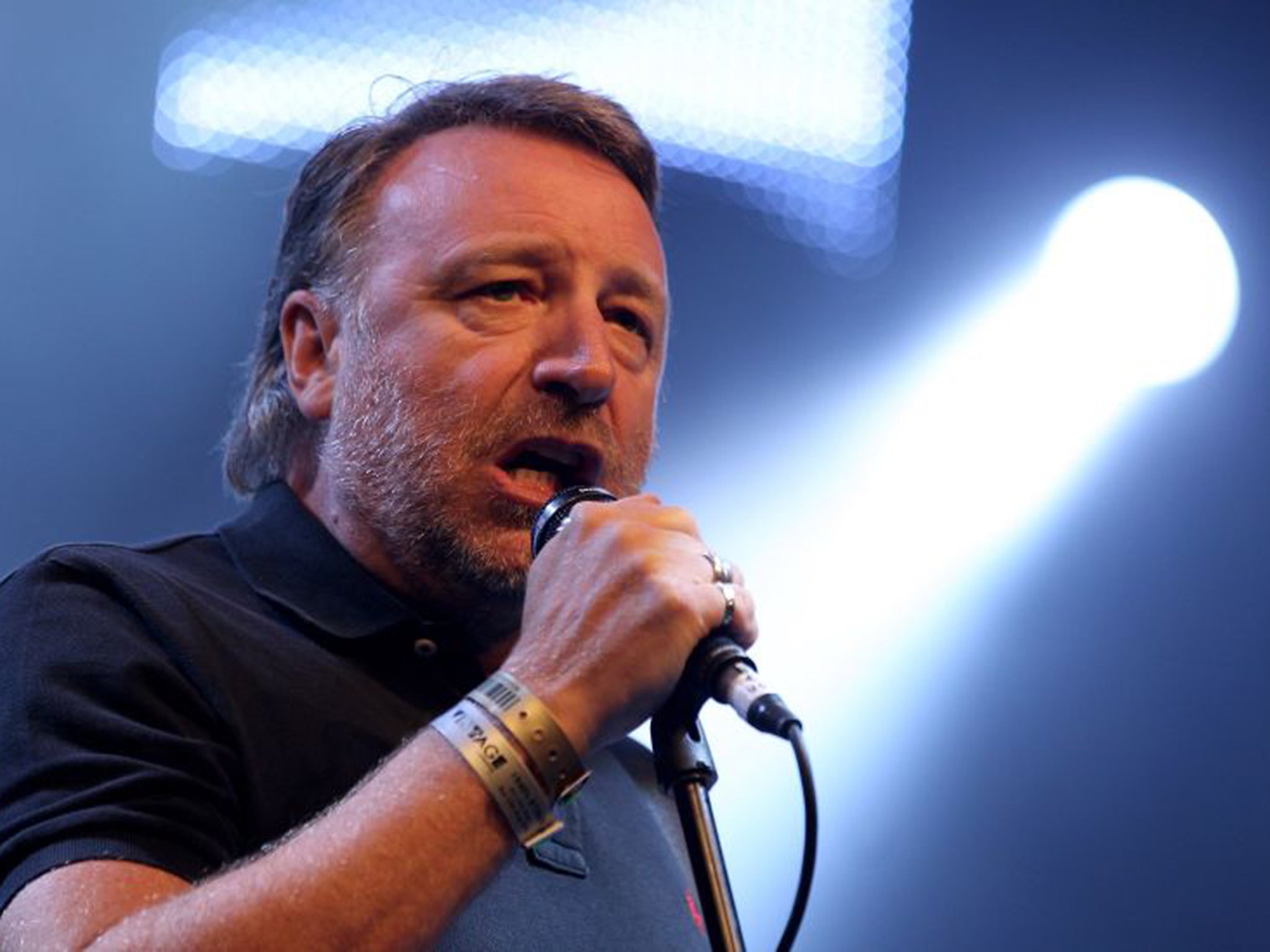 Peter Hook, pictured in 2010, claims he has lost more than £2.3m after his former New Order bandmates set up a new company in 2011
