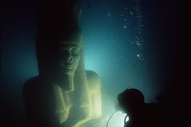 A red-granite statue of the god Hapy at Aboukir Bay in Egypt. The five-metre statue will feature in an exhibition at the British Museum opening in May