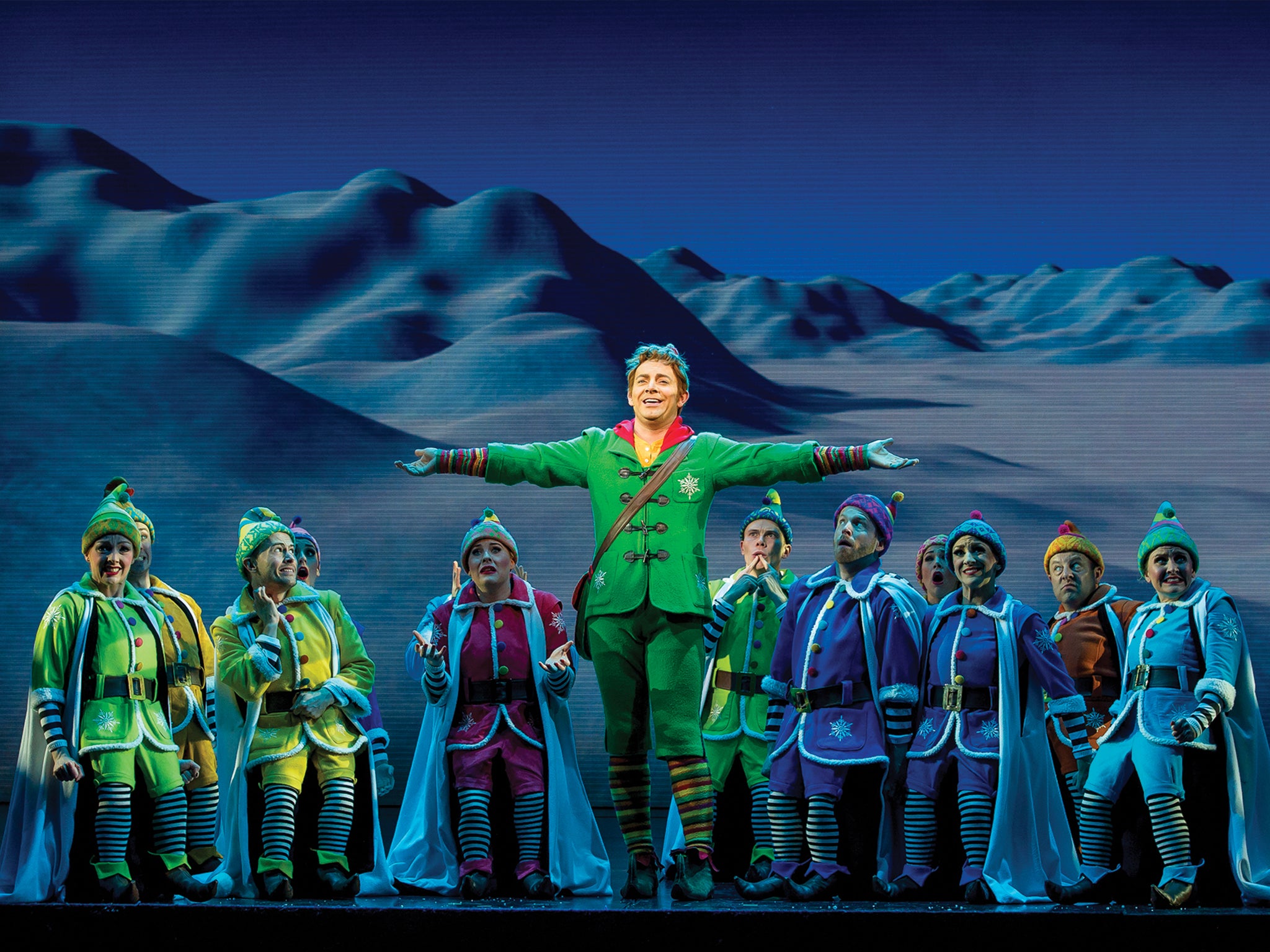The cast of the West End smash hit Elf in action