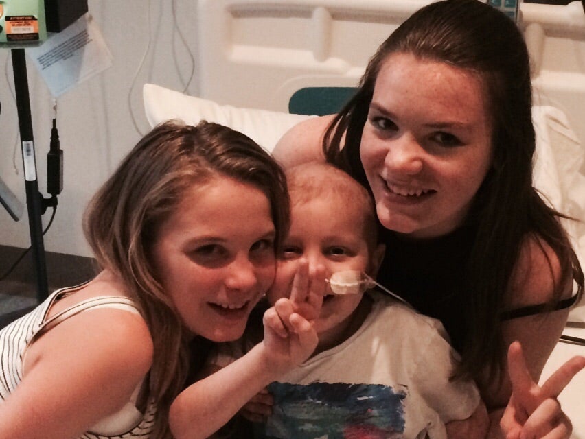 James recovers after his transplant with his two sisters