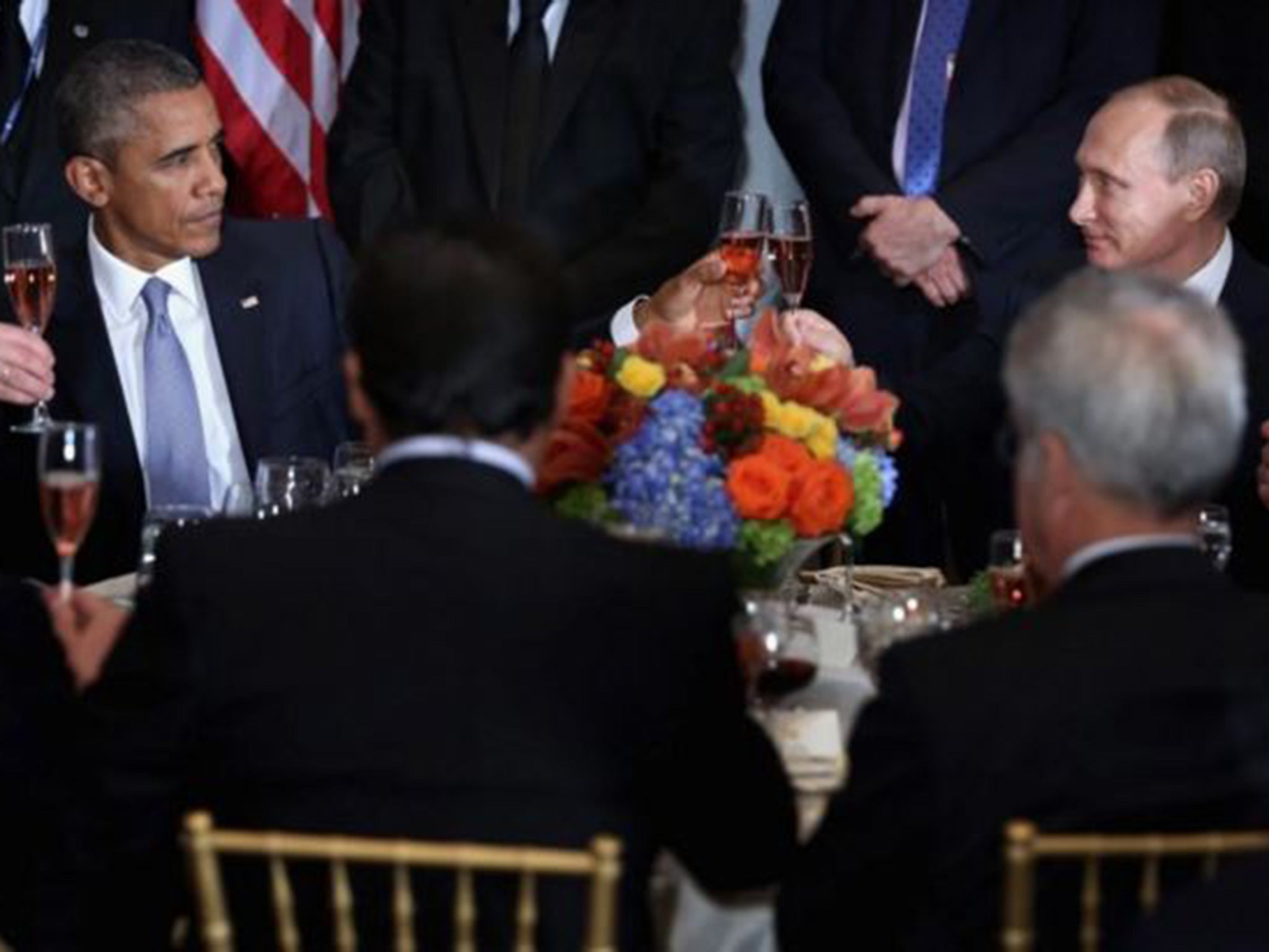 President Obama and Russian President Vladimir Putin toast during a luncheon hosted by U.N. Secretary General Ban Ki-moon during the 70th annual U.N. General Assembly in New York on Sept. 28