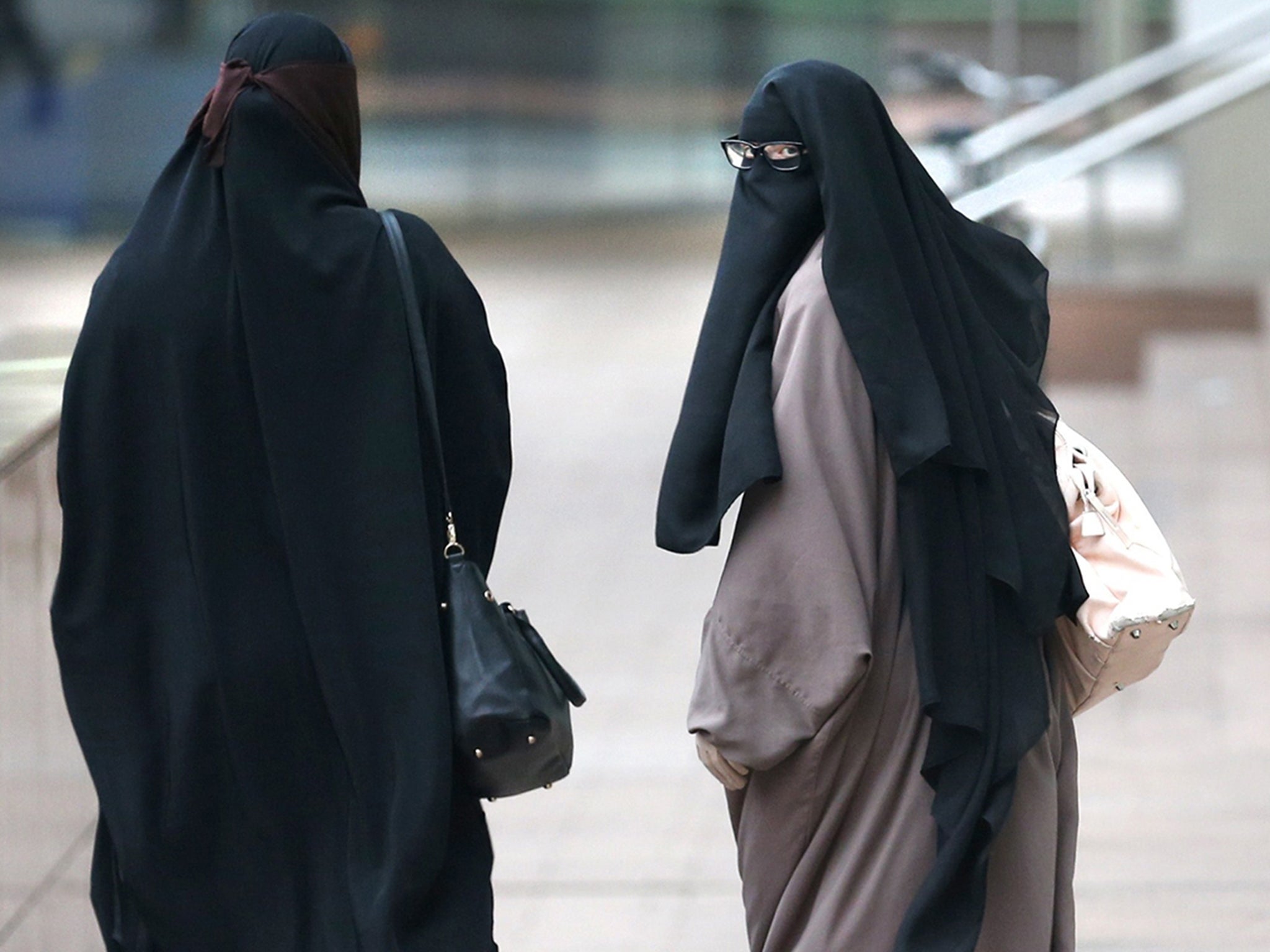 Two women wearing Islamic veils