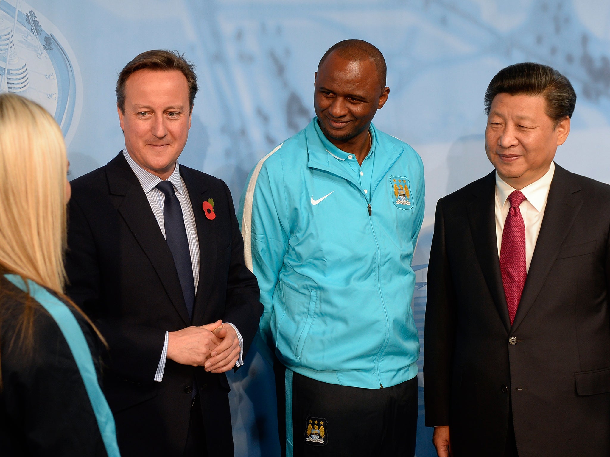Patrick Vieira, formerly Manchester City's reserve team coach, and women's team striker Toni Duggan meet Prime Minister David Cameron and Chinese president Xi Jinping
