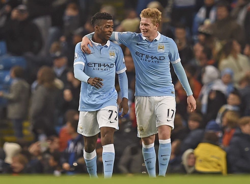 Kevin De Bruyne is congratulated, after scoring City's fourth, by striker Kelechi Iheanacho, who also got on the scoresheet