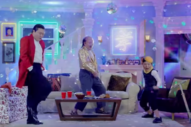 Psy as himself, his father and his son in yet another crazy video