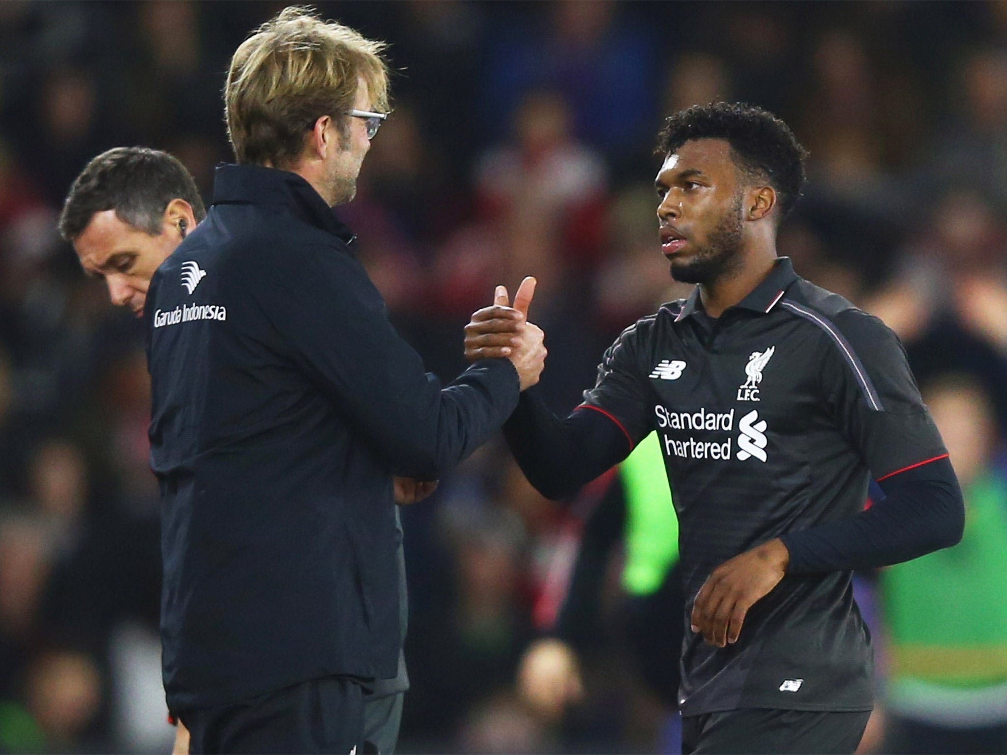 Daniel Sturridge of Liverpool shakes hands with Jurgen Klopp manager of Liverpool as he is substituted
