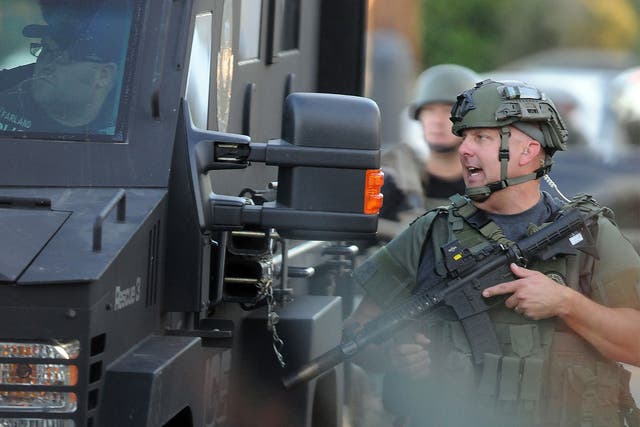 SWAT teams scour San Bernardino after the mass shooting at the social services centre
