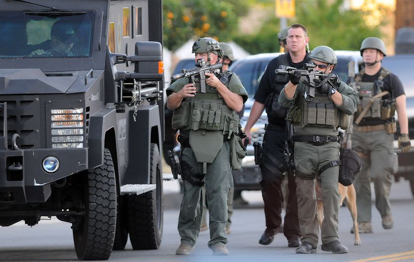 Authorities search for assailants following a shooting that killed multiple people at a social services center for the disabled in San Bernardino, California.