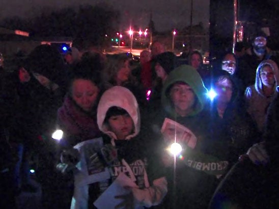 Torch-light vigil held for missing teen