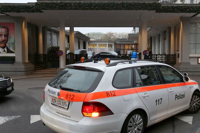 A police car in front of the entrance of the Hotel Baur au Lac in Zurich, where Swiss authorities conducted an early-morning operation to arrest several Fifa football officials on 3 December