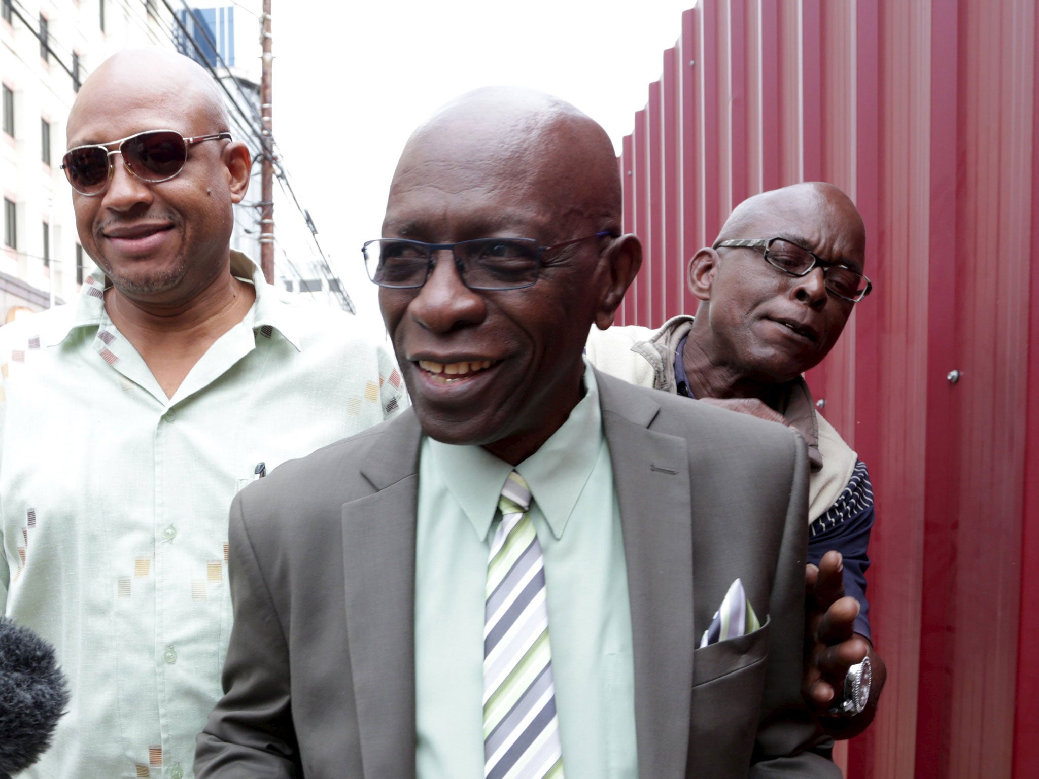 Jack Warner, centre, is alleged to have appropriated Fifa funds intended for natural disaster relief