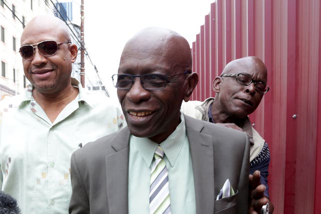 Jack Warner, centre, is alleged to have appropriated Fifa funds intended for natural disaster relief