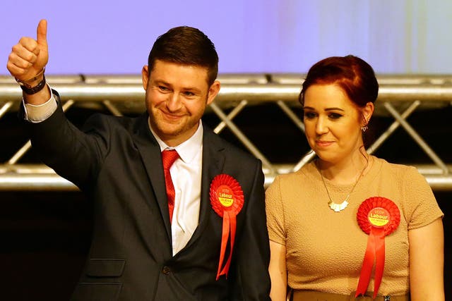 Victorious Labour candidate Jim McMahon with his partner Charlene after winning the Oldham West and Royton by-election