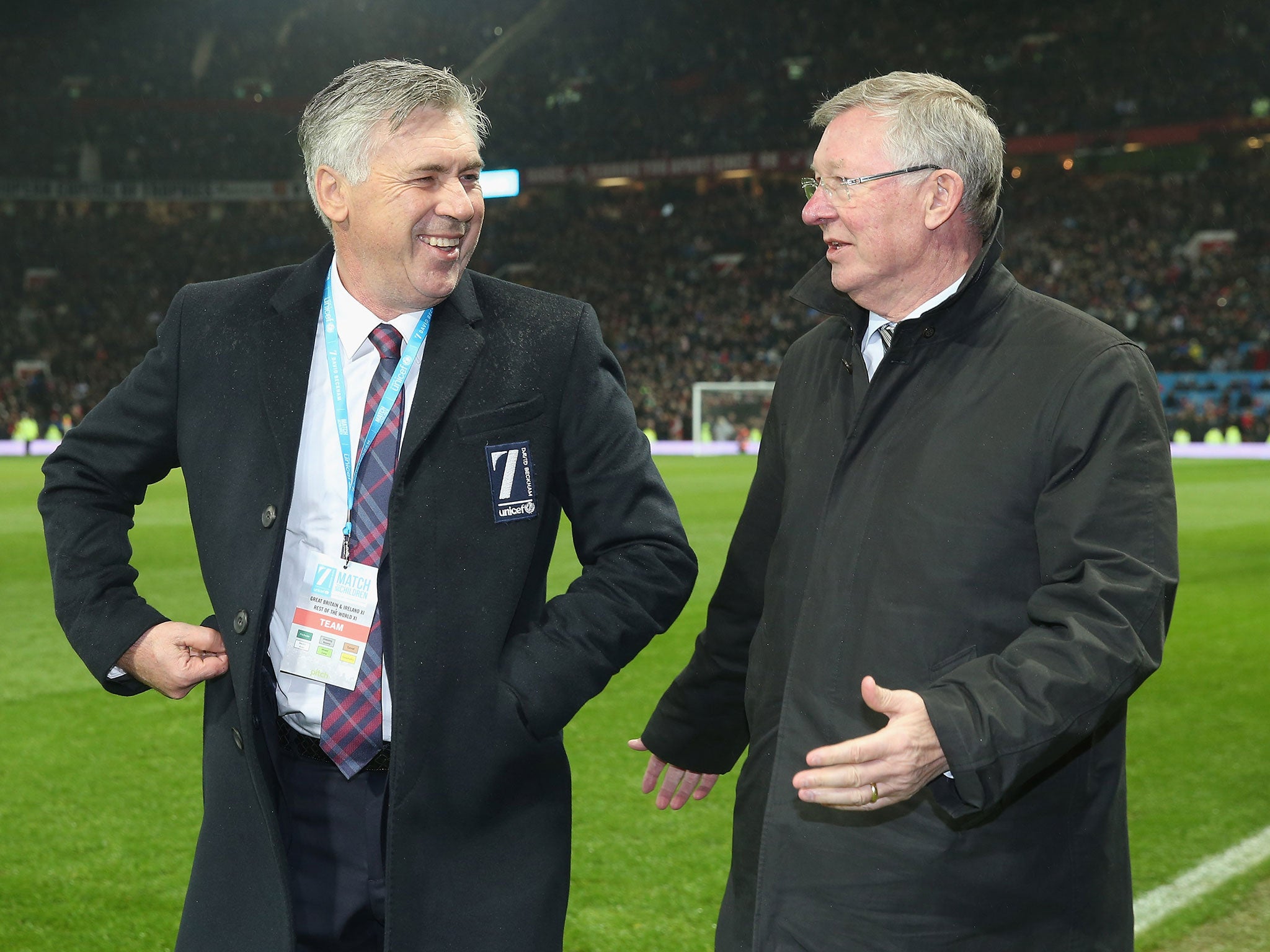 Carlo Ancelotti and Sir Alex Ferguson talks following the Unicef Charity Match at Old Trafford