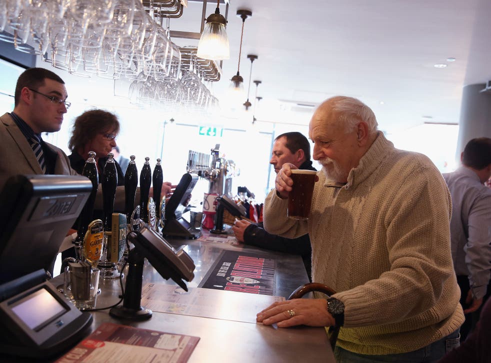 The JD Wetherspoon pub, the 'Hope And Champion', opens for the first day of trading in the Extra Motorway Service Area at junction 2 of the M40 motorway on January 21, 2014 in Beaconsfield, England