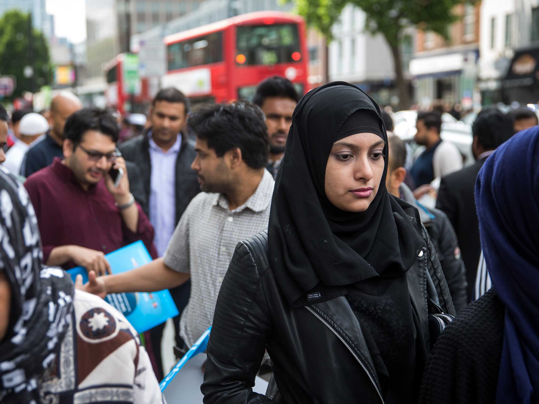 British Muslims leave an East London mosque following prayers