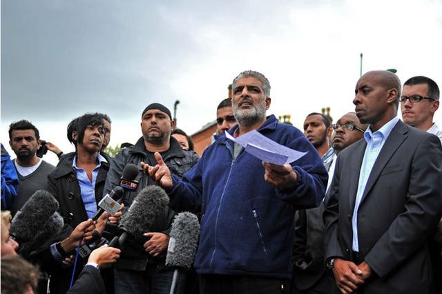 Tariq Jahan, father of Haroon Jahan, gives a statement to the media near the crime scene where Haroon and two other Asian men were hit by a car and killed