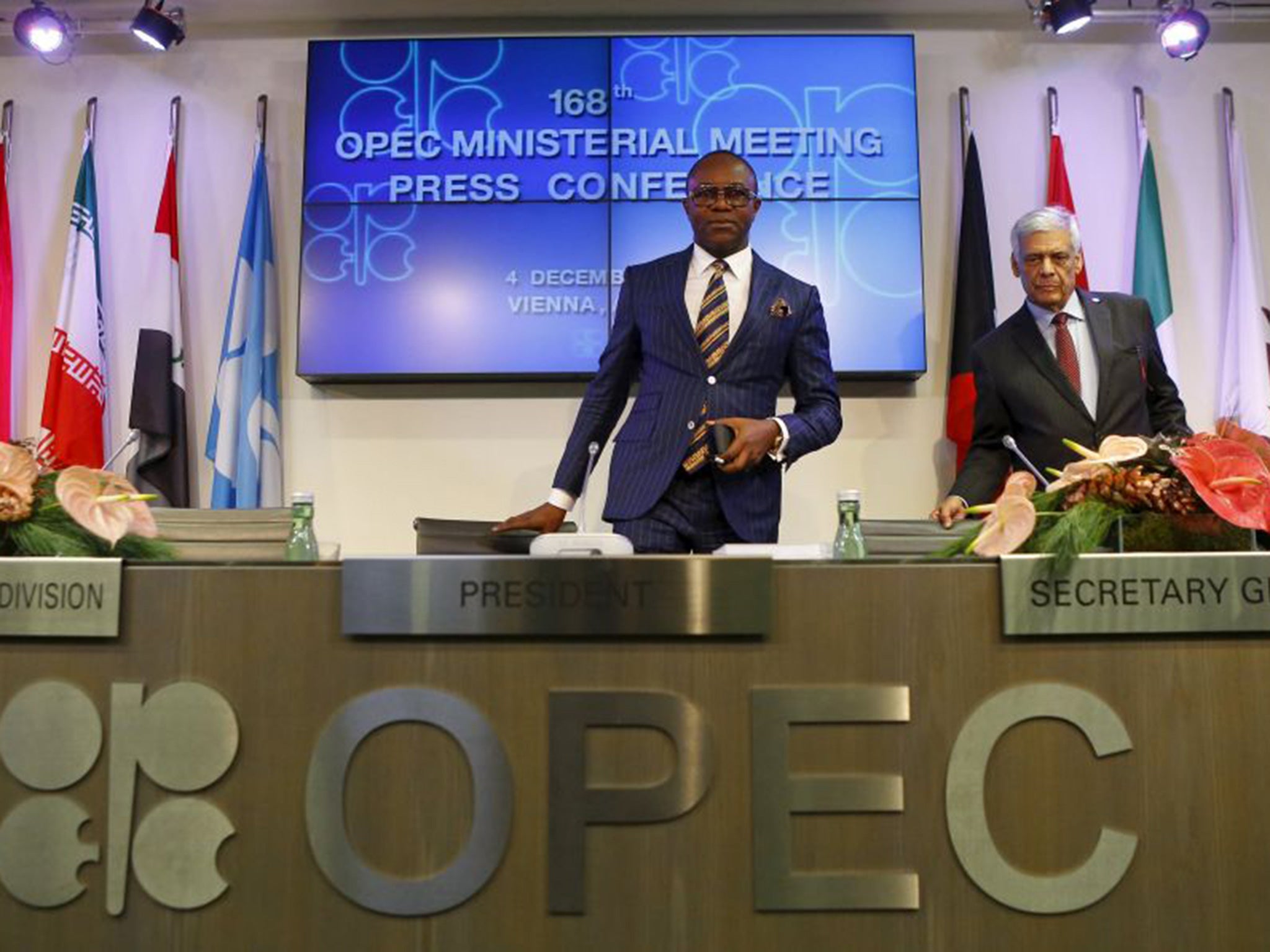 Nigeria's Oil Minister and OPEC president Emmanuel Ibe Kachikwu (L) and OPEC secretary general Abdullah al-Badri arrive for a news conference