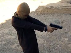 Isis uses young boys to kill prisoners in ruined Syrian castle