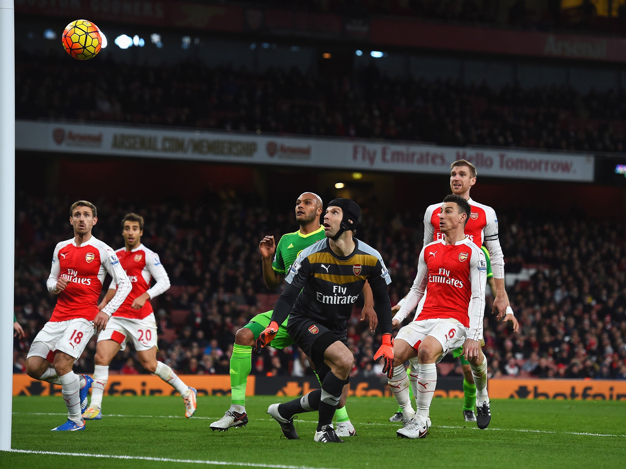 Petr Cech watches as Olivier Giroud's flick goes in for an own-goal