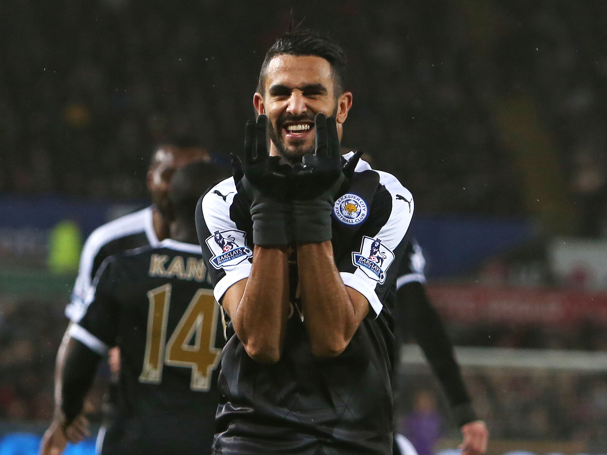 Riyad Mahrez celebrates his hat-trick for Leicester against Swansea